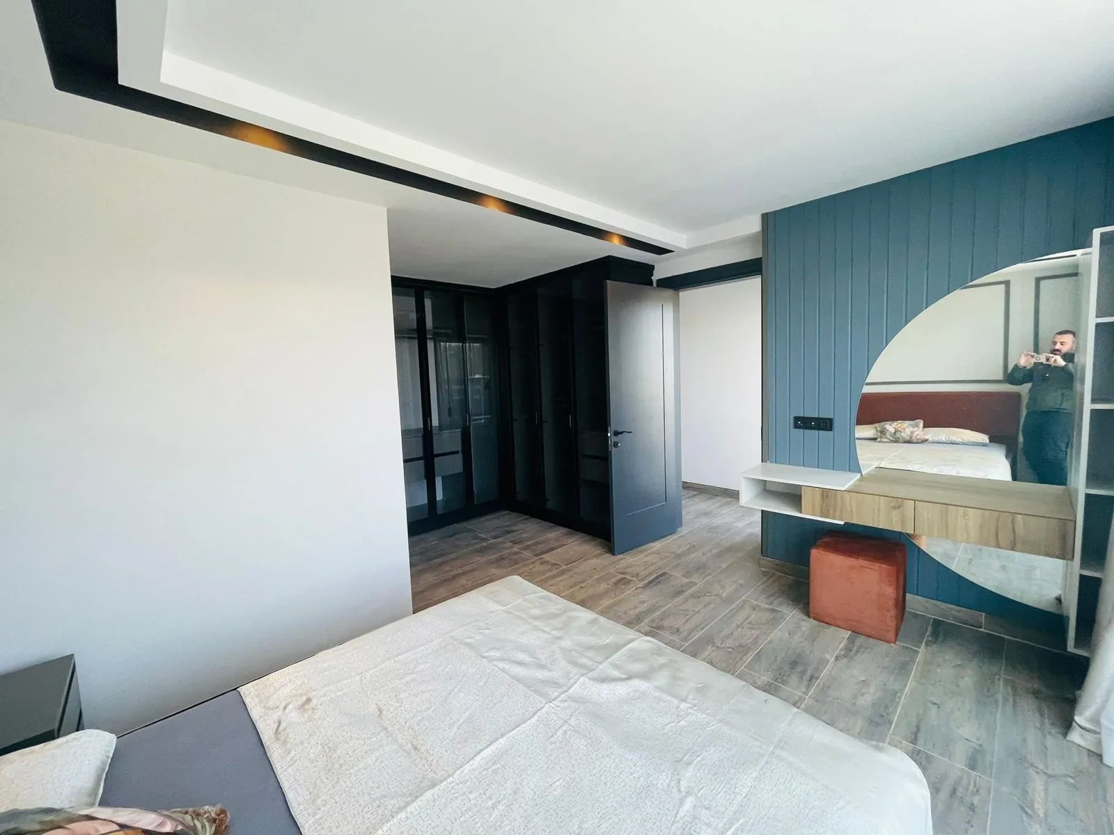 Bedroom with dressing table and wardrobe